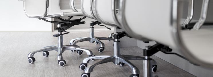 White Office Chairs on Wheeled Castor Bases
