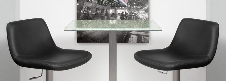Two Black Bar Stools at Brushed Steel Bar Table