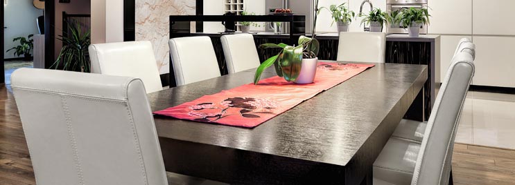 White Leather Dining Chairs at Black Wooden Dining Table